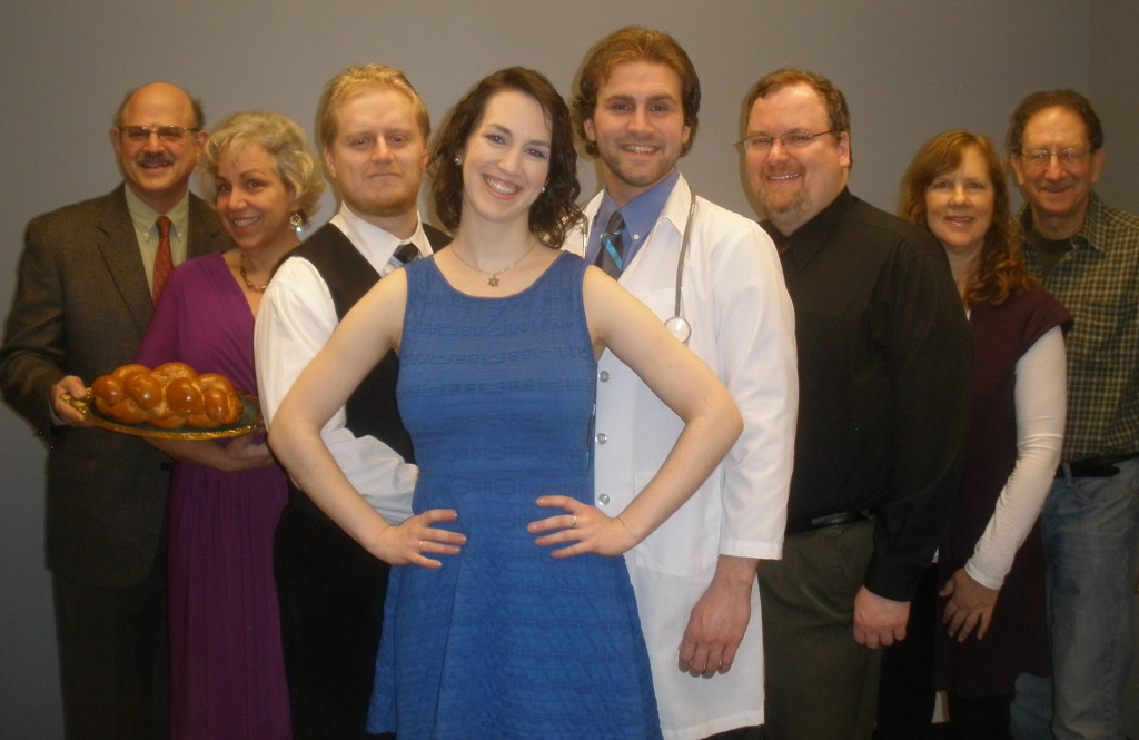 It’s all about Sara in the Seattle Jewish Theater Company’s spring production of the romantic comedy hit, “Beau Jest.” Left to right, Al Hilell, member of Temple Beth Am, Mary Brown, Isaiah J. Smith, Sara Schweid, MacKenzie Mott, Ian McIntire, Rona Feldman, assistant director, member of Congregation Beth Shalom, and Art Feinglass, director. 